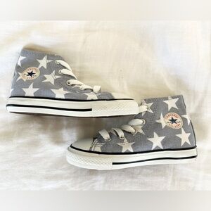 Toddler size 8 high top converse light blue with white stars. Never worn